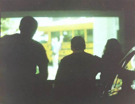 photo of friends watching a movie/series
